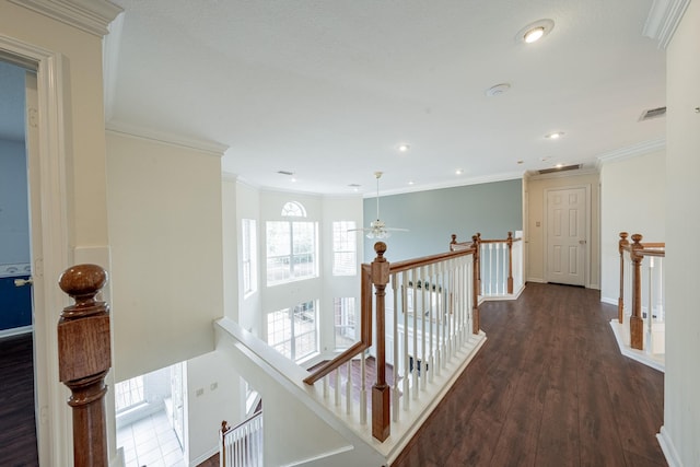 13141 Nicholson Rd, Conroe, TX 77303 - hallway featuring an upstairs landing, dark wood-type flooring, recessed lighting, and crown molding