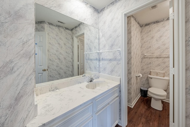 13141 Nicholson Rd, Conroe, TX 77303 - bathroom featuring vanity and wood finished floors