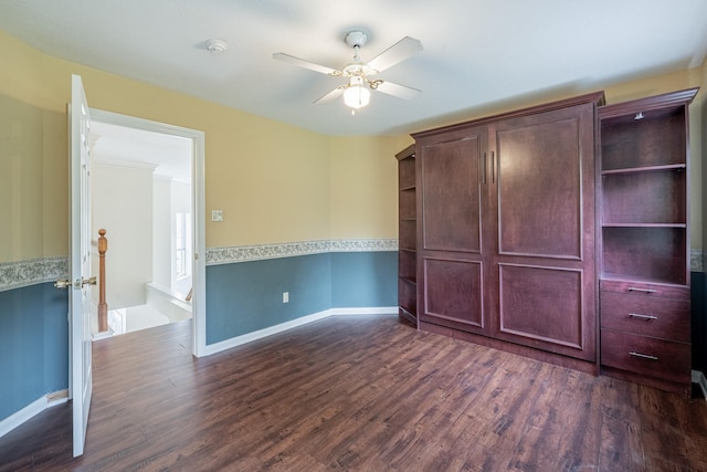 13141 Nicholson Rd, Conroe, TX 77303 - empty room featuring ceiling fan, dark wood-type flooring, and a smoke detector