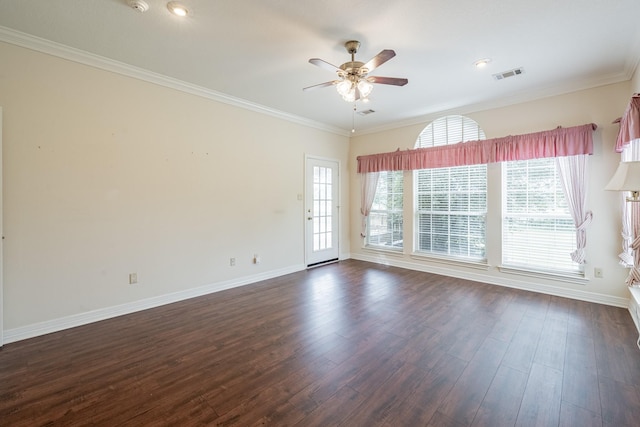 13141 Nicholson Rd, Conroe, TX 77303 - empty room featuring ceiling fan, dark wood-style floors, and ornamental molding