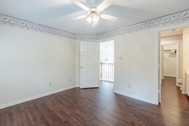 13141 Nicholson Rd, Conroe, TX 77303 - empty room featuring ceiling fan and dark wood finished floors