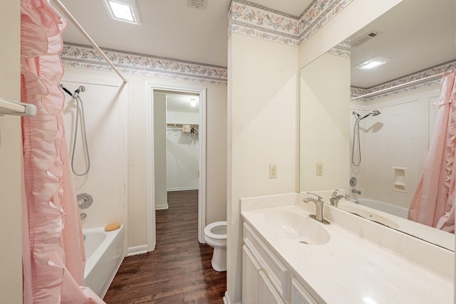 13141 Nicholson Rd, Conroe, TX 77303 - bathroom featuring shower / bath combo with shower curtain, wood finished floors, and vanity