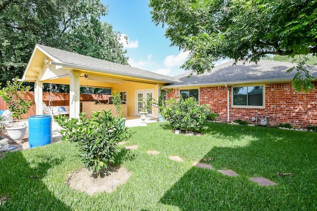 9411 Kingsvalley St, Houston, TX 77075 - back of house featuring french doors, brick siding, a patio, and roof with shingles