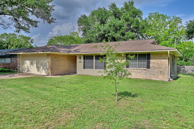204 Meadow Ln, Brenham, TX 77833 - ranch-style home featuring brick siding, an attached garage, and driveway
