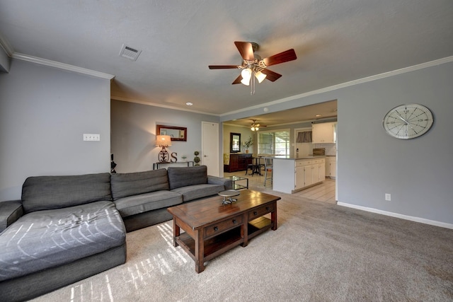 204 Meadow Ln, Brenham, TX 77833 - living area featuring ceiling fan, ornamental molding, and light carpet