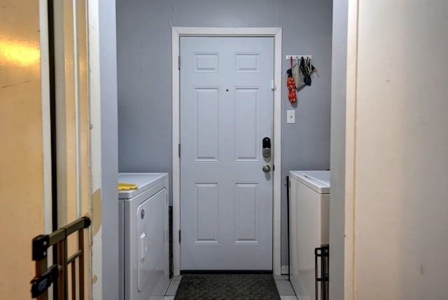 204 Meadow Ln, Brenham, TX 77833 - laundry room featuring separate washer and dryer and light tile patterned floors