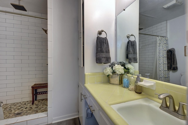 204 Meadow Ln, Brenham, TX 77833 - bathroom with tiled shower and vanity