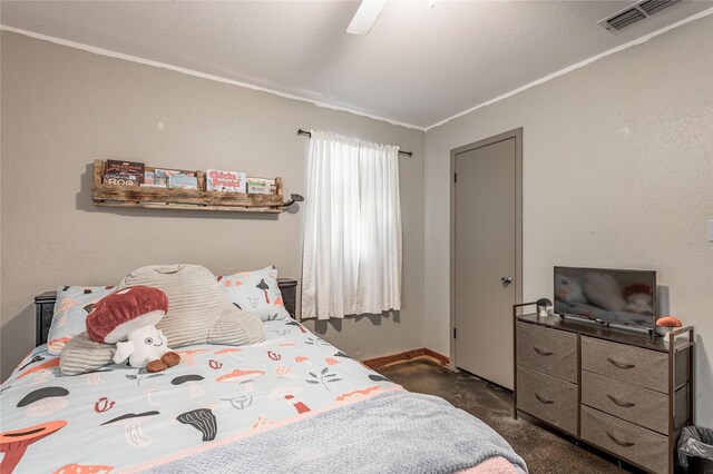 1205 W Houston Ave W, Crockett, TX 75835 - bedroom featuring ornamental molding, finished concrete floors, and ceiling fan