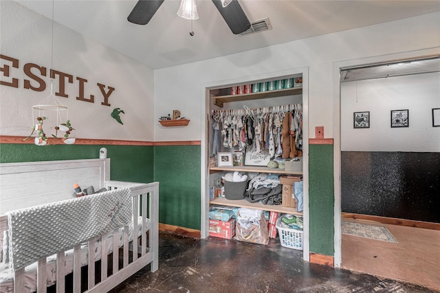 1205 W Houston Ave W, Crockett, TX 75835 - bedroom with concrete flooring and ceiling fan