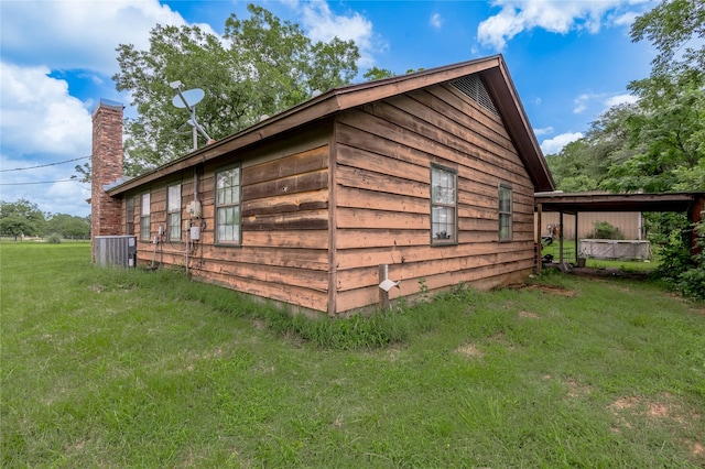 1205 W Houston Ave W, Crockett, TX 75835 - view of side of property featuring a yard and a chimney