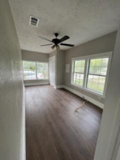 3109 Anita St, Houston, TX 77004 - unfurnished living room with wood finished floors and ceiling fan