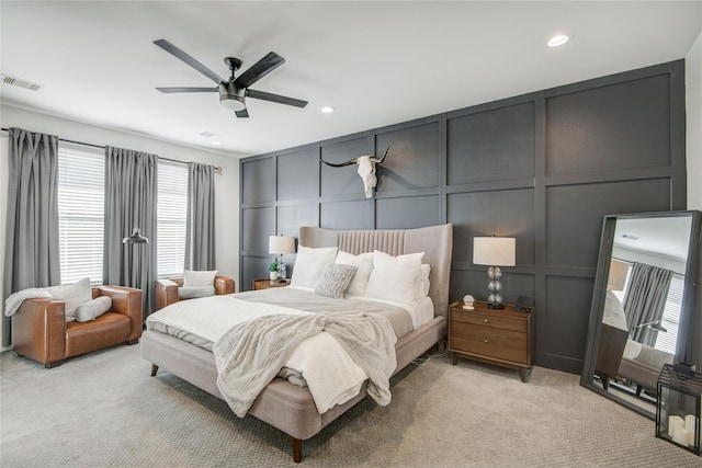 818 Fisher St, Houston, TX 77018 - bedroom with a decorative wall, light colored carpet, recessed lighting, and a ceiling fan