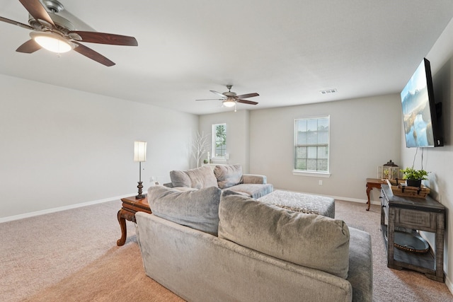 10126 Bayou Oaks Dr, Conroe, TX 77385 - living area with ceiling fan and light colored carpet