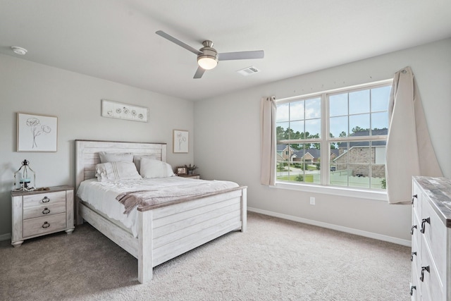 10126 Bayou Oaks Dr, Conroe, TX 77385 - bedroom with carpet floors and ceiling fan