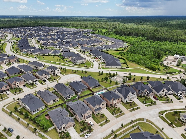 10126 Bayou Oaks Dr, Conroe, TX 77385 - aerial view of property's location with a forest and nearby suburban area