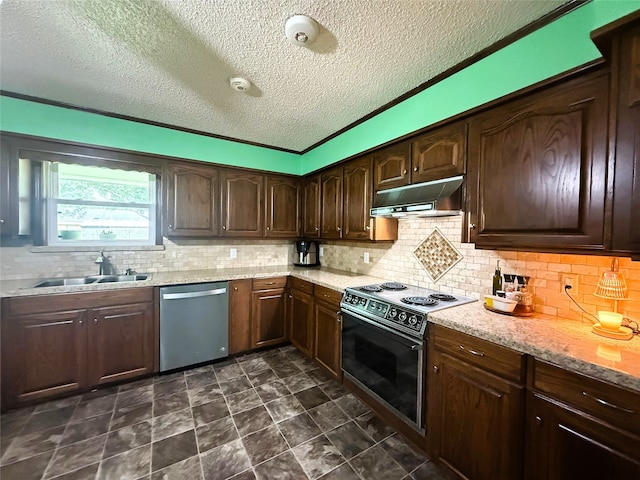 1006 Fairlane Dr, Ganado, TX 77962 - kitchen with stainless steel dishwasher, range with electric stovetop, under cabinet range hood, a textured ceiling, and backsplash