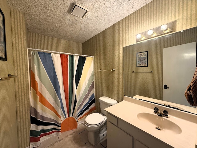 1006 Fairlane Dr, Ganado, TX 77962 - full bathroom featuring a textured ceiling, vanity, tile patterned flooring, a shower with curtain, and wallpapered walls