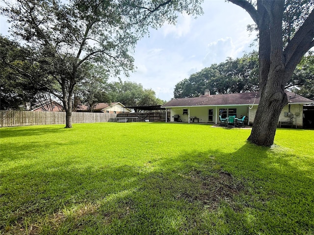 1006 Fairlane Dr, Ganado, TX 77962 - view of yard with a patio area