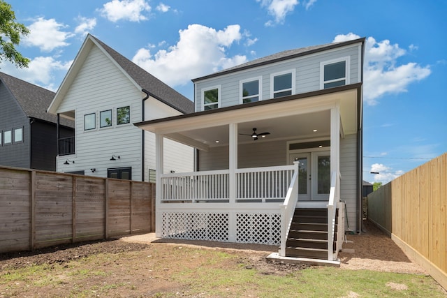3224 Omega St, Houston, TX 77022 - back of house with a fenced backyard and covered porch