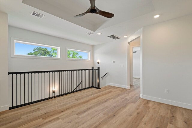 3224 Omega St, Houston, TX 77022 - spare room with recessed lighting, light wood-type flooring, and a ceiling fan