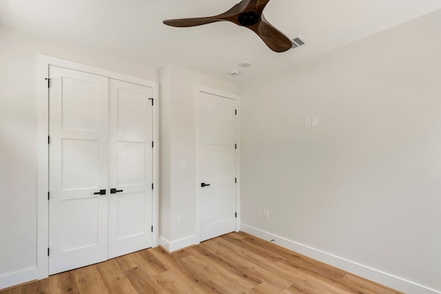 3224 Omega St, Houston, TX 77022 - unfurnished bedroom featuring light wood-style floors, a closet, and ceiling fan