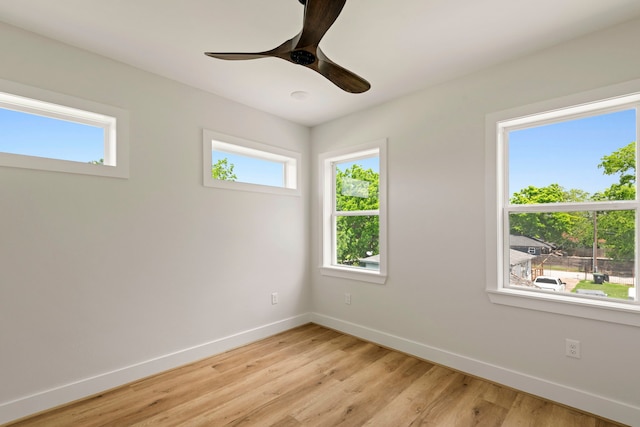 3224 Omega St, Houston, TX 77022 - spare room with healthy amount of natural light, light wood-type flooring, and ceiling fan