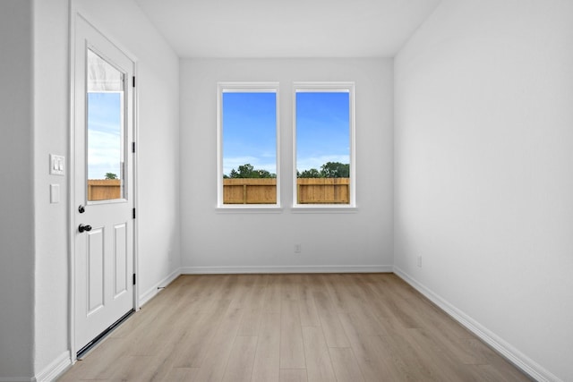 4770 Ara Dr, Richmond, TX 77469 - spare room with light wood-type flooring and baseboards