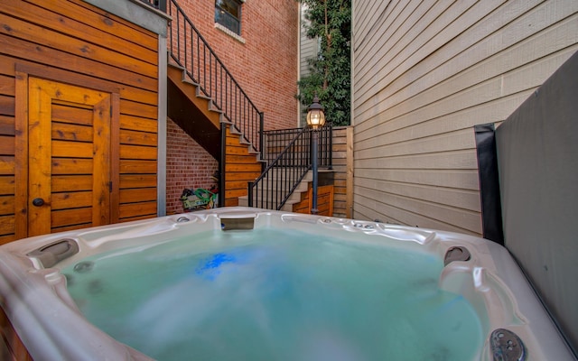 6205 Dell St, Houston, TX 77007 - view of patio / terrace with stairs and a hot tub