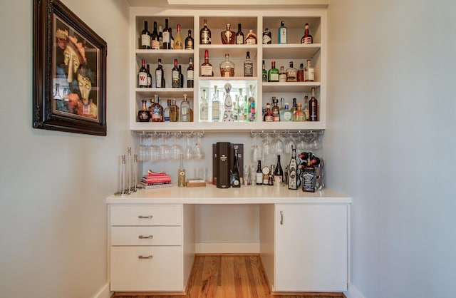 6205 Dell St, Houston, TX 77007 - indoor dry bar featuring light wood-style flooring and baseboards
