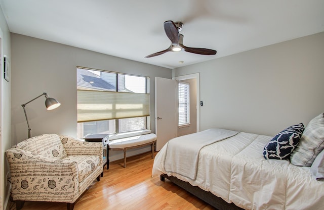 6205 Dell St, Houston, TX 77007 - bedroom with light wood-style flooring and ceiling fan