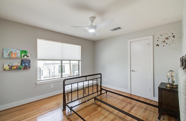 6205 Dell St, Houston, TX 77007 - bedroom with wood finished floors and a ceiling fan