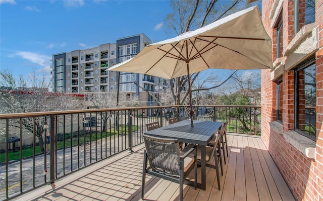 6205 Dell St, Houston, TX 77007 - wooden deck featuring outdoor dining space