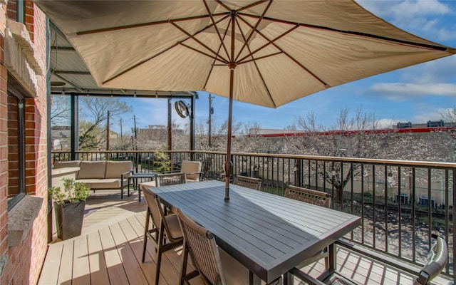 6205 Dell St, Houston, TX 77007 - wooden deck featuring an outdoor living space and outdoor dining area