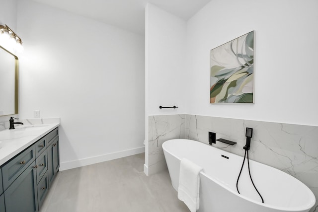 5520 Chapman St, Houston, TX 77009 - full bath with double vanity, a soaking tub, tile walls, and wainscoting