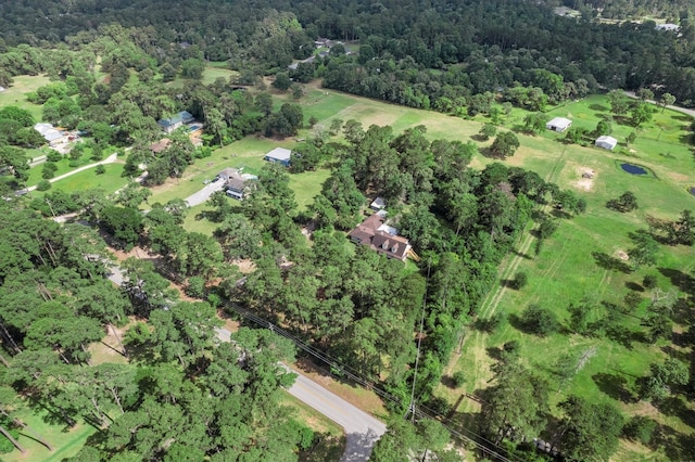 15025 Stagecoach Rd, Stagecoach, TX 77355 - view of property location featuring a heavily wooded area
