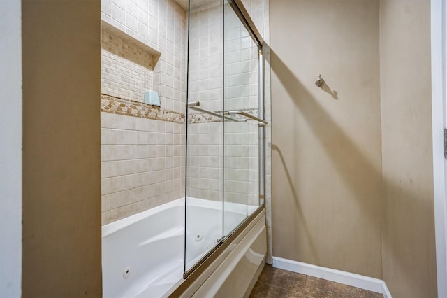 2601 Augusta Dr Unit 26, Houston, TX 77057 - full bath featuring a combined bath / shower with jetted tub and tile patterned flooring