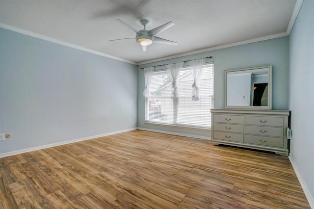 2601 Augusta Dr Unit 26, Houston, TX 77057 - unfurnished bedroom with crown molding, wood finished floors, and a ceiling fan