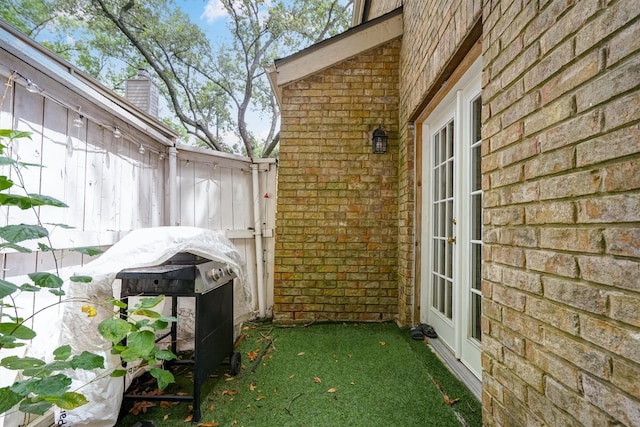 2601 Augusta Dr Unit 26, Houston, TX 77057 - view of patio with french doors and area for grilling