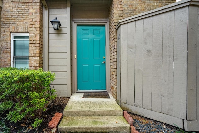 2601 Augusta Dr Unit 26, Houston, TX 77057 - doorway to property featuring brick siding