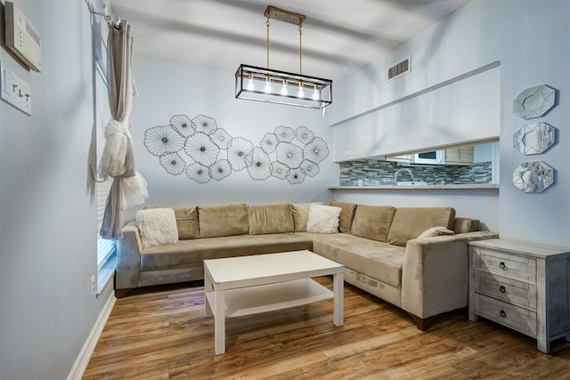 2601 Augusta Dr Unit 26, Houston, TX 77057 - living area with wood finished floors and baseboards