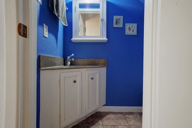 2601 Augusta Dr Unit 26, Houston, TX 77057 - bathroom with tile patterned flooring and vanity