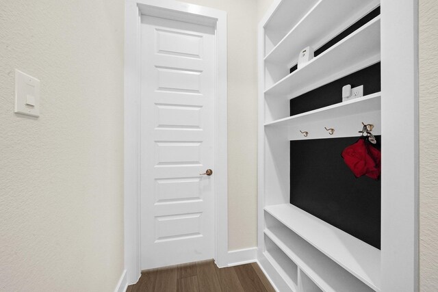 20210 Rolling Vista Dr, Cypress, TX 77433 - mudroom featuring dark wood-type flooring and a textured wall