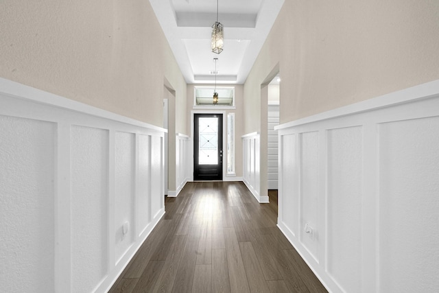 20210 Rolling Vista Dr, Cypress, TX 77433 - foyer entrance featuring a decorative wall, a wainscoted wall, and dark wood-style floors
