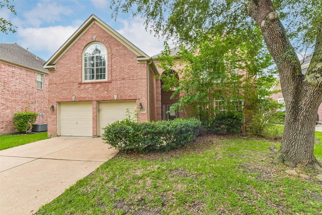 13719 Country Green Ct, Houston, TX 77059 - view of front of home with a garage, brick siding, concrete driveway, and a front yard