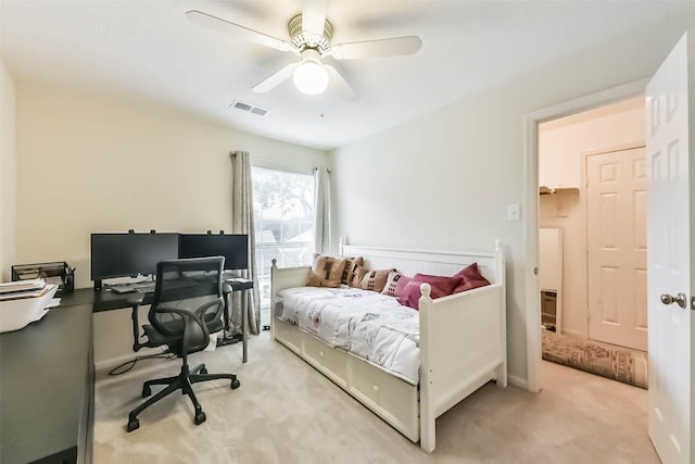 13719 Country Green Ct, Houston, TX 77059 - bedroom with light colored carpet, a desk, and a ceiling fan