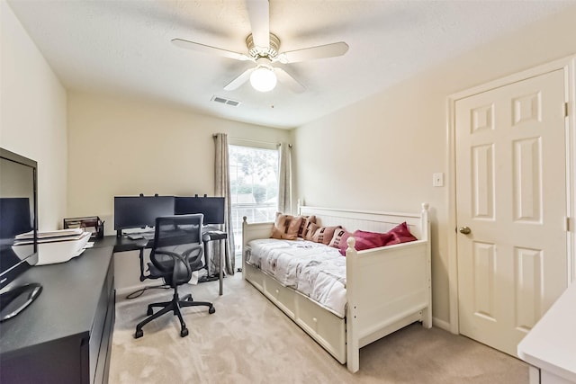 13719 Country Green Ct, Houston, TX 77059 - bedroom with light carpet, a desk, and ceiling fan
