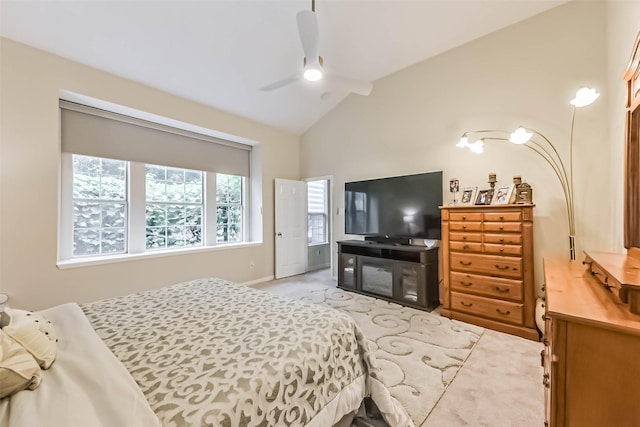 13719 Country Green Ct, Houston, TX 77059 - bedroom featuring light carpet, vaulted ceiling, and a ceiling fan