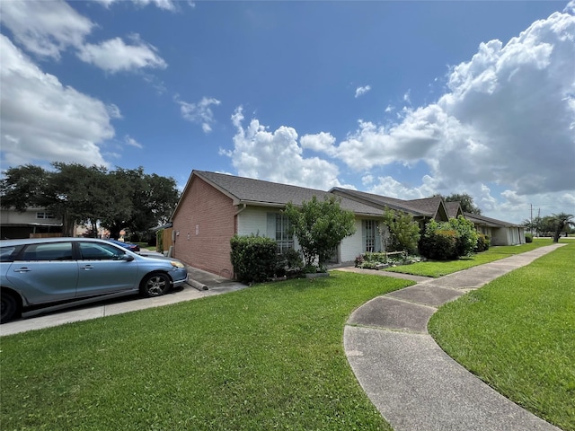 8330 Leamont Dr, Houston, TX 77072 - view of front facade with brick siding and a front yard