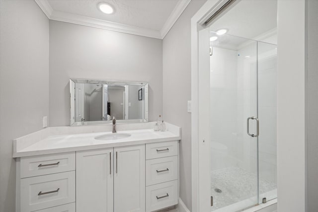 8703 Chelmsford Ln, Spring, TX 77379 - full bathroom with ornamental molding, vanity, and a stall shower