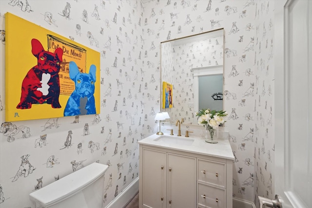 8703 Chelmsford Ln, Spring, TX 77379 - half bathroom with wallpapered walls and vanity
